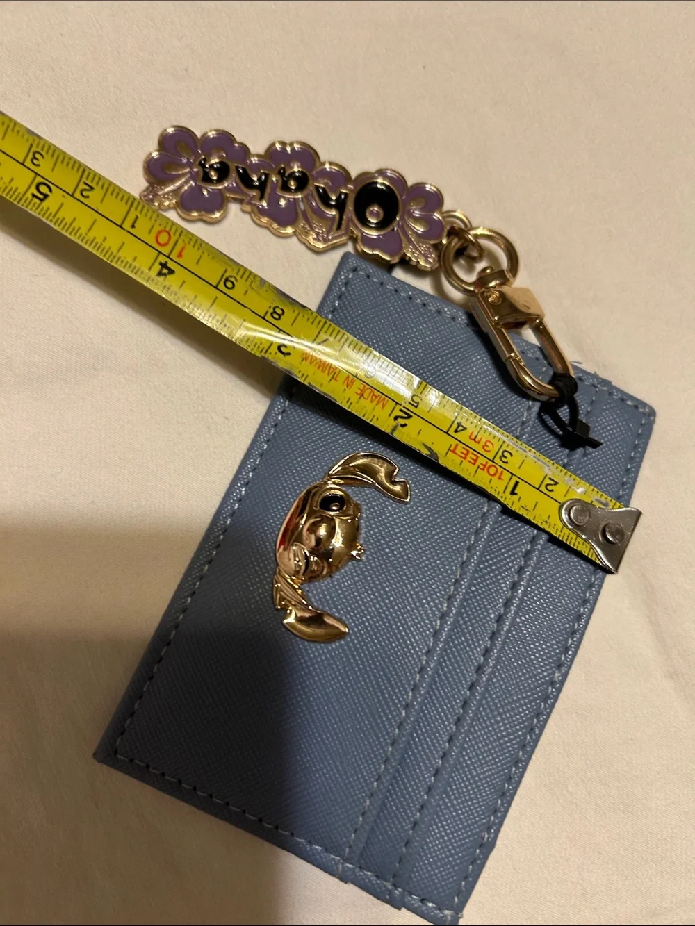 Disney Blue Card Holder Keychain with Gold Crab Charm and Purple Flower Tag